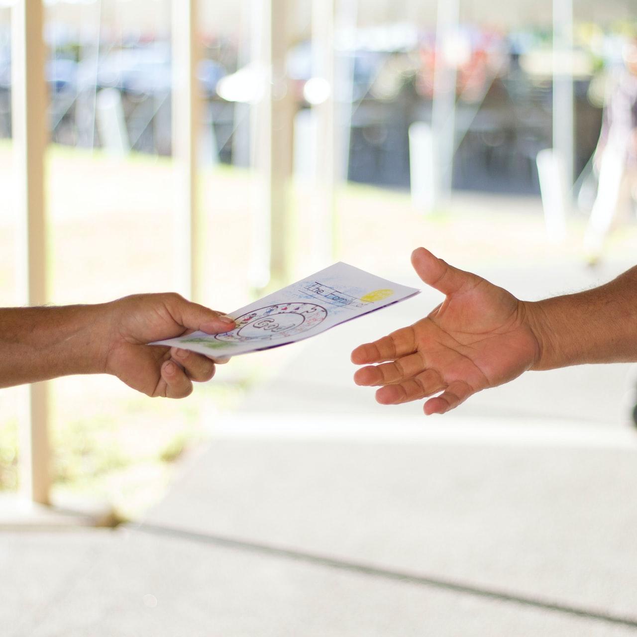 person holding card